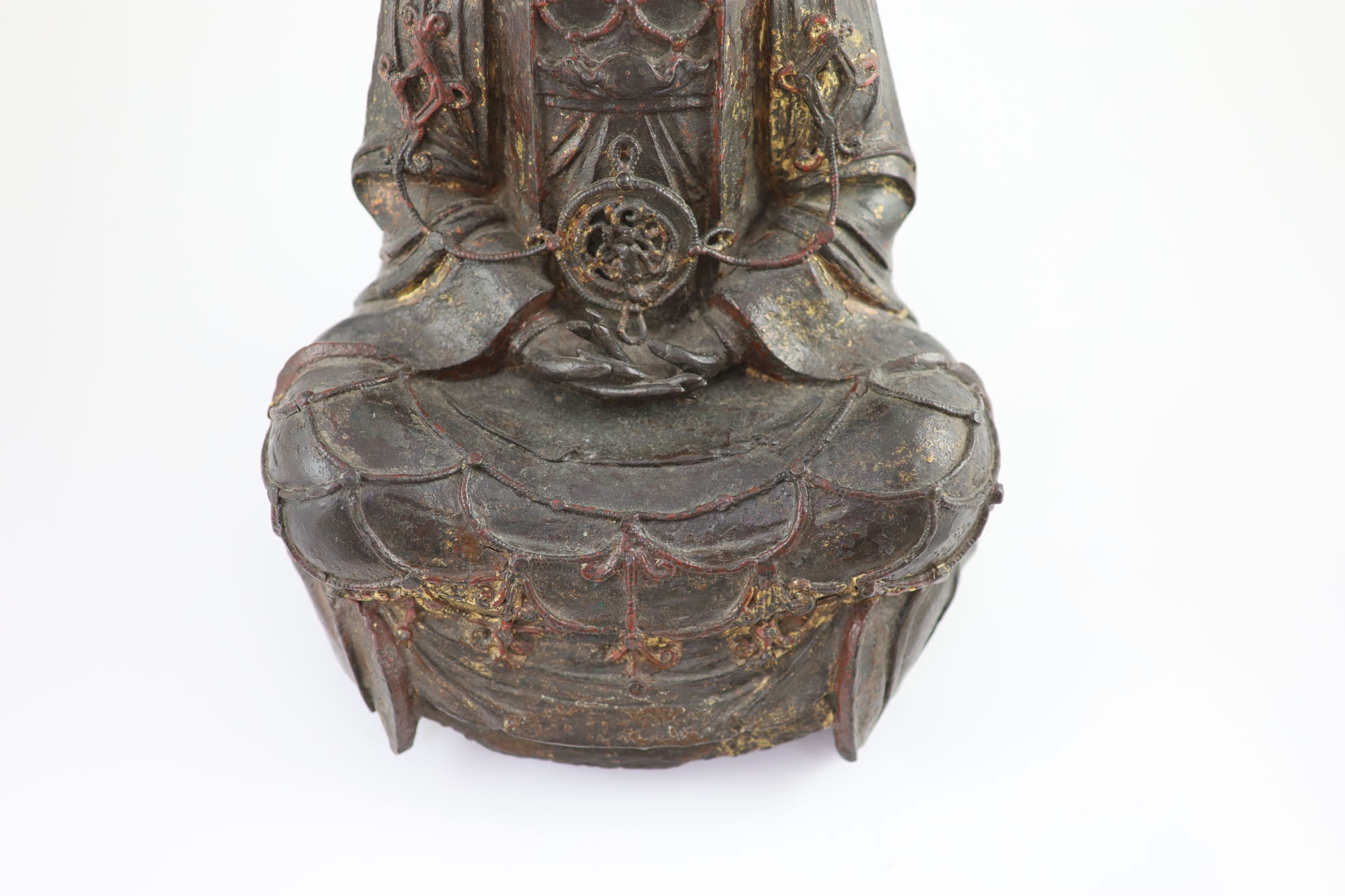 A large Chinese Ming bronze figure of a Bodhisattva, 16th/17th century, 41.5cm high, minor losses
